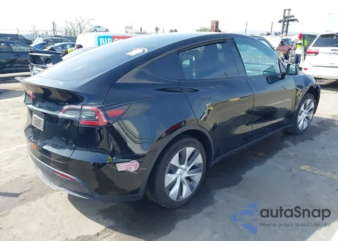 2023 Tesla Model Y Rwd from USA, damaged, VIN 7SAYGDED3PF923668